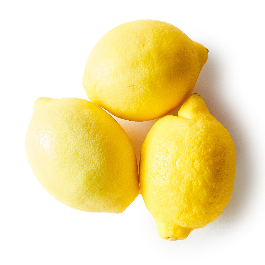 Three lemons on a white background