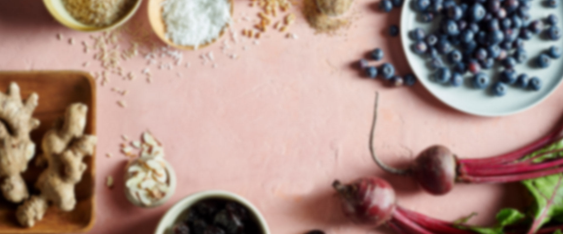 Blurred image of wholefood ingredients such as blueberry and beats.